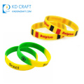 Großhandel Werbebenutzerdefinierte umweltfreundliche Souvenir Sport Landesflagge Logo Druck Silikon Armband Gummiarmband